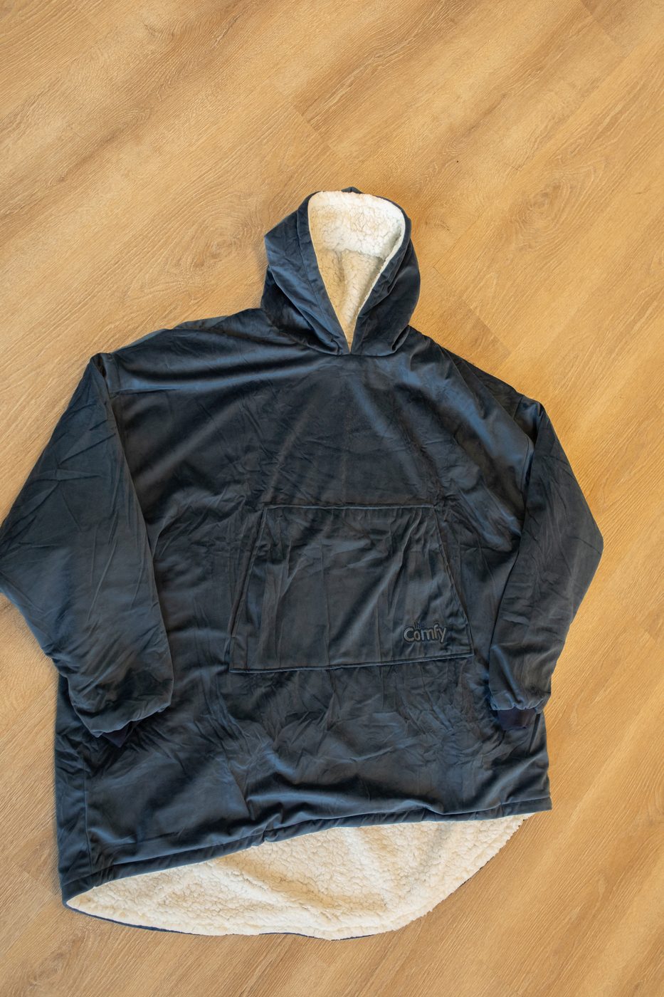 The Comfy blanket hoodie laid flat
